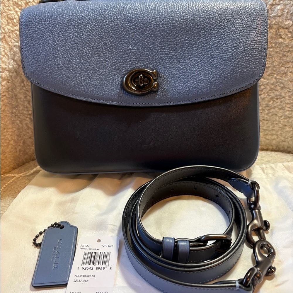 Original release Coach Cassie
Full size navy/light blue